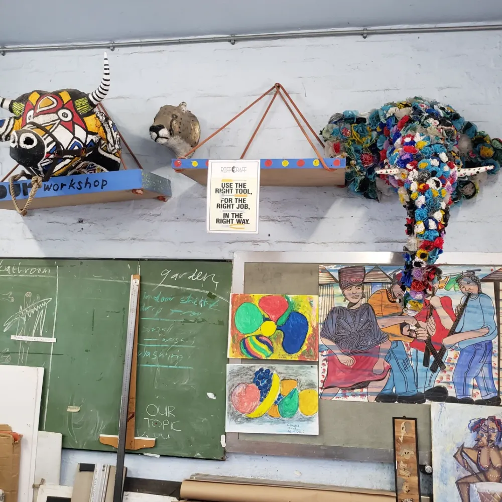 Sculptures and a noticeboard in the art workshop