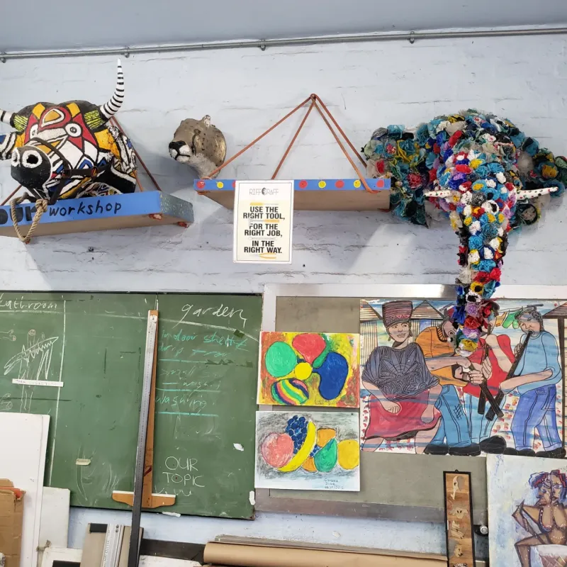 Sculptures and a noticeboard in the art workshop