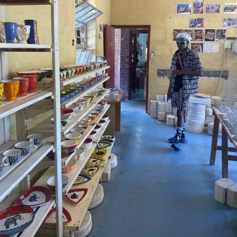 Shelves of pottery in the ceramic workshop