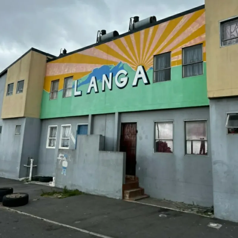 The LANGA mural painted across a building facade