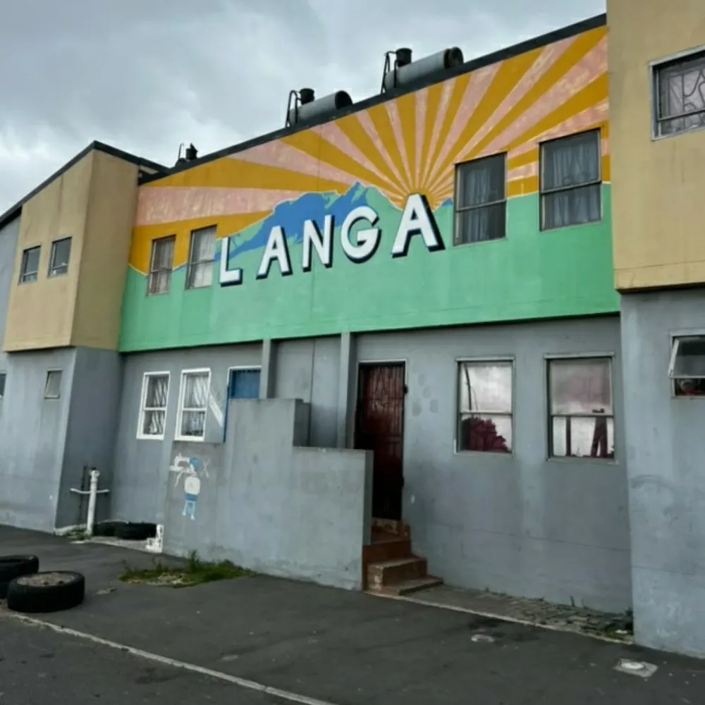 The LANGA mural painted across a building facade
