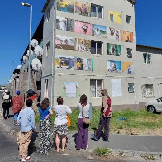 Tour group photographed at the exhibition about the flats