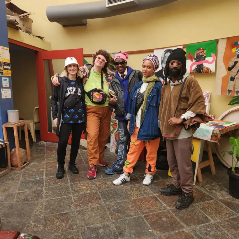 Tour group portrait in the Guga S'thebe courtyard